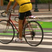 photo of bike rider on bike to work day